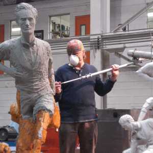 Technician enlarging statue. The statue was enlarged 3 times prior to installation